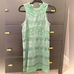 Green lace dress with high neck
